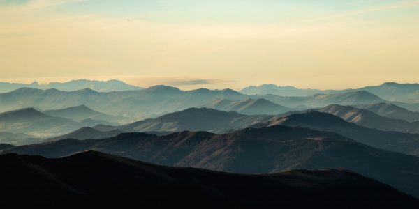 Mountain silhouettes in a cool morning