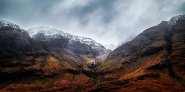 Glencoe, Scotland: stream in snowy mountains