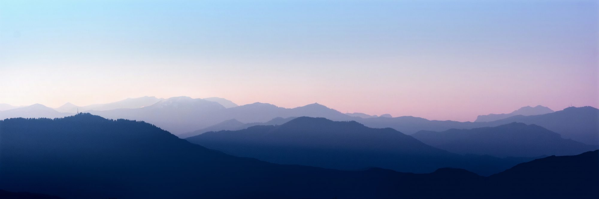 Mountain silhouettes  withthe first rays of light